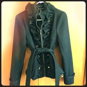 Black belted coat with ruffle and buttons.